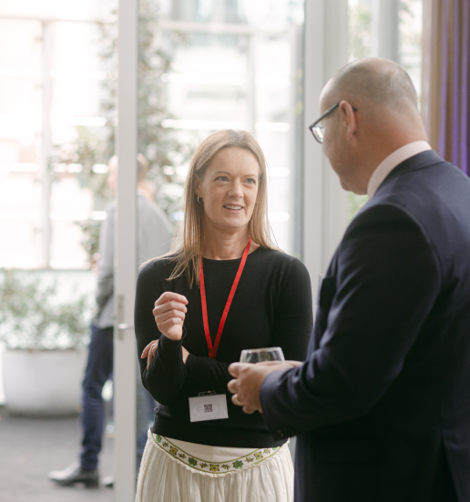 IBISWorld colleagues talking at an industry event